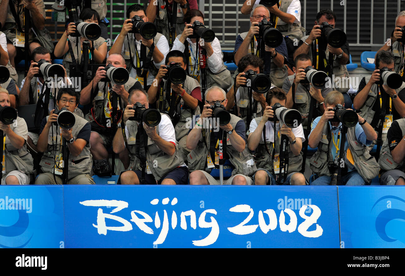 Photographers working at the National Aquatics Center during the Beijing Olympics 2008 Stock Photo