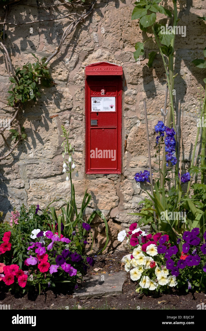 Post Box with Flowers, Isle of Wight, UK Stock Photo