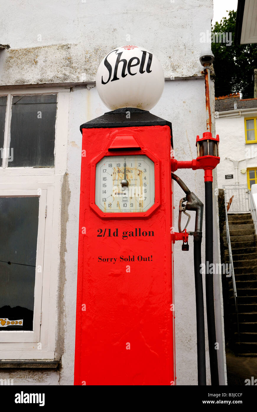 Red vintage Shell petrol pump Cornwall Stock Photo