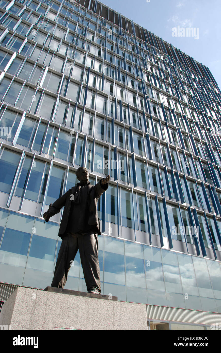 Moving statue of man outside the Blue Fin Building Sumner Street London