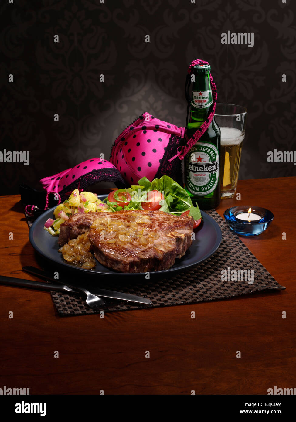 T bone steak and potato salad editorial food Stock Photo - Alamy