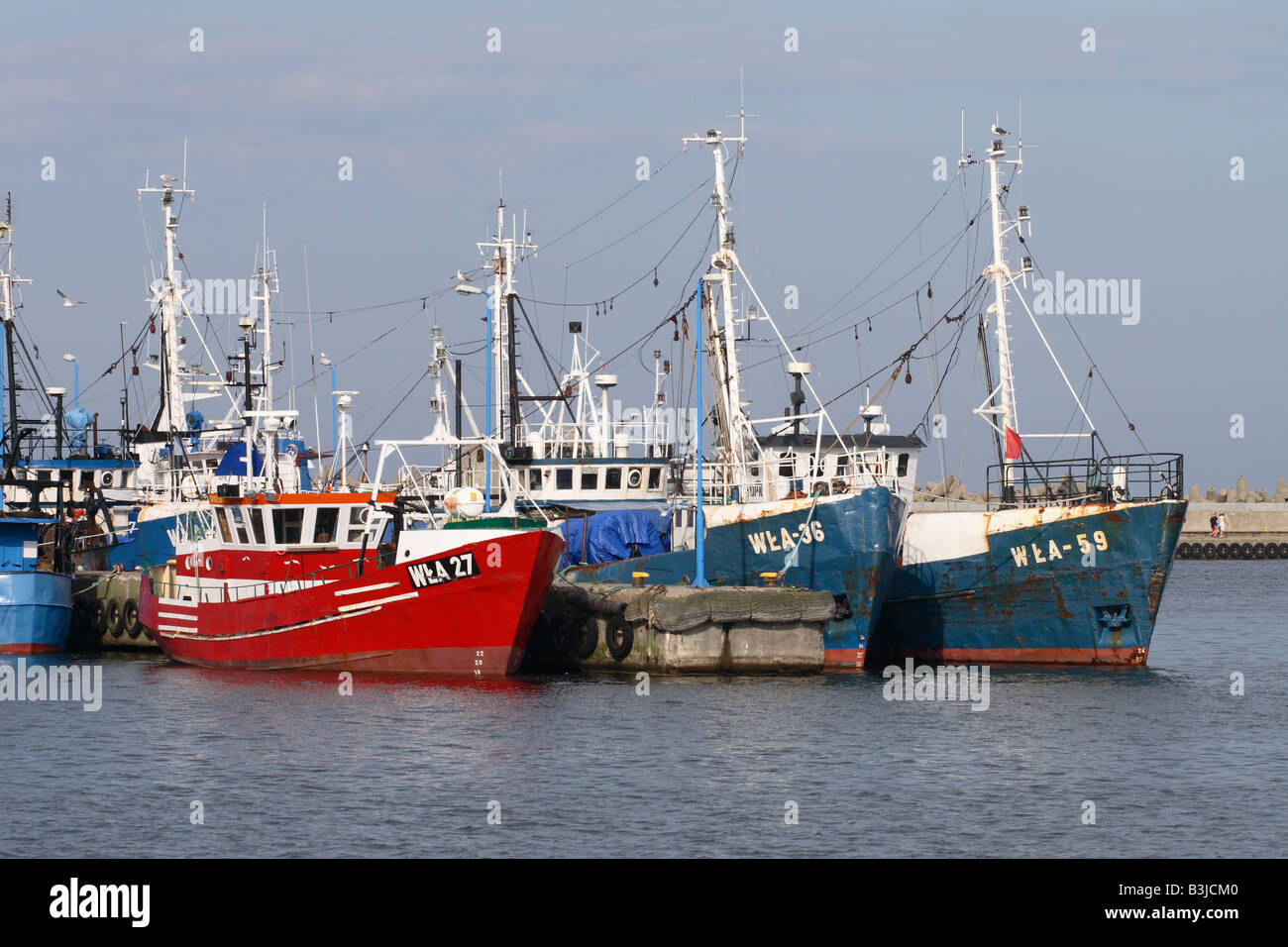 Wladyslawowo Poland busy port harbour scene with fishing vessel boats moored at this Baltic Sea town Stock Photo