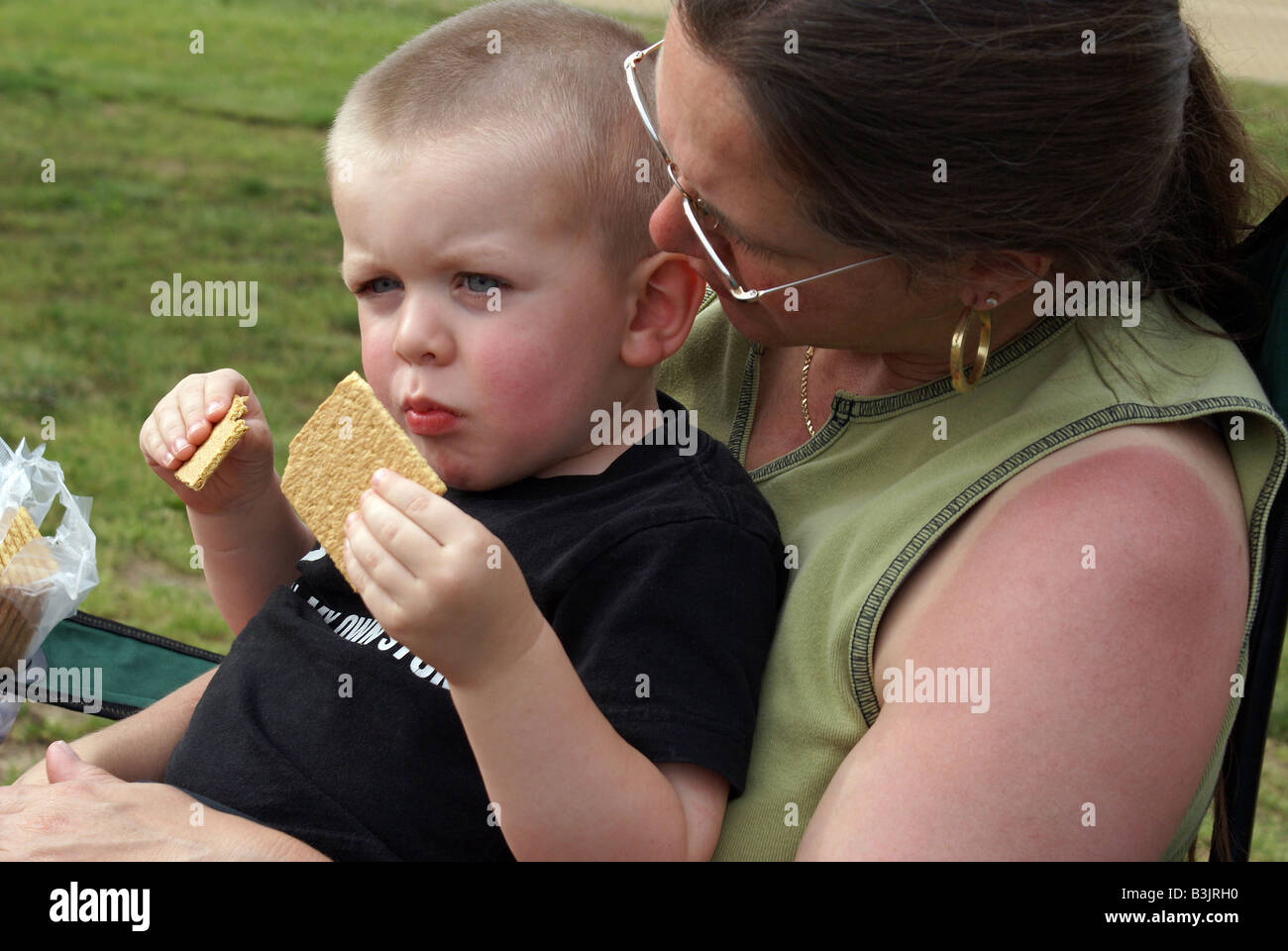 Eating a Graham Cracker Stock Photo Alamy