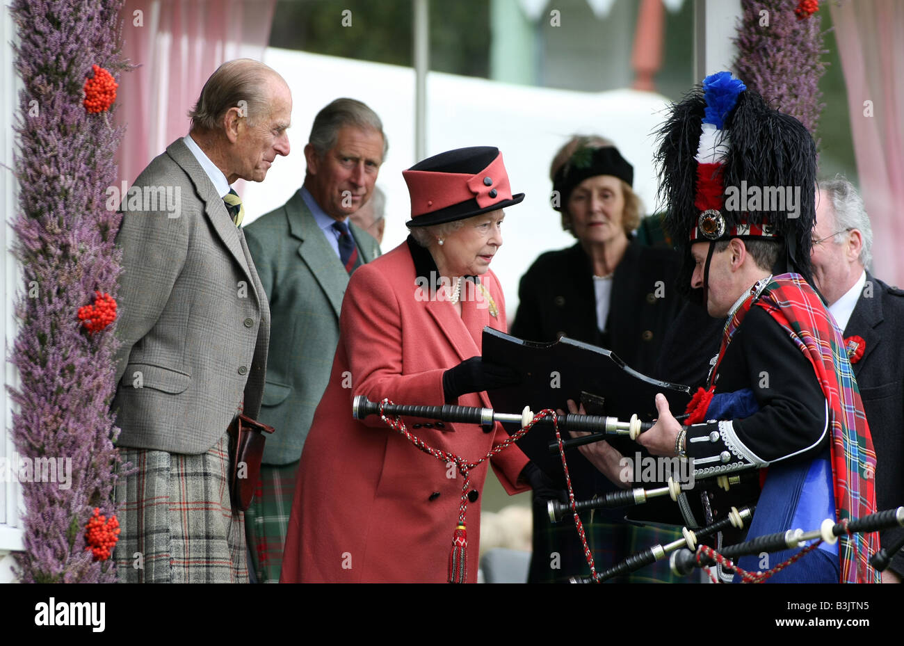 The Queen, Prince Philip and Prince Charles present the prizes at the famous Braemar Gathering in Aberdeenshire, Scotland, UK Stock Photo