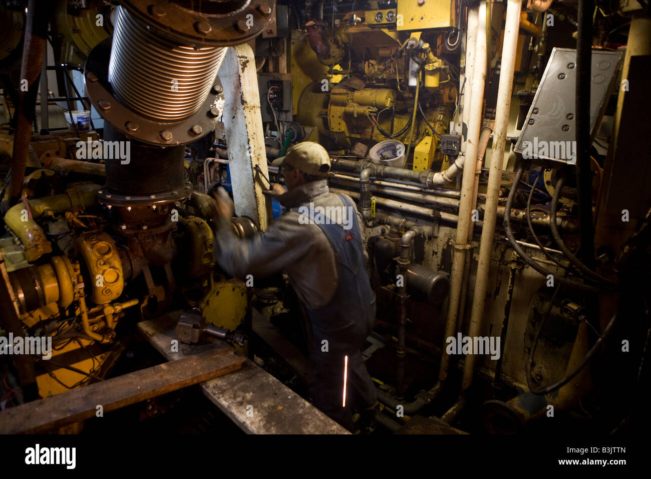 Milton Bud Altom a welder at the shipyard in Port Townsend works on the