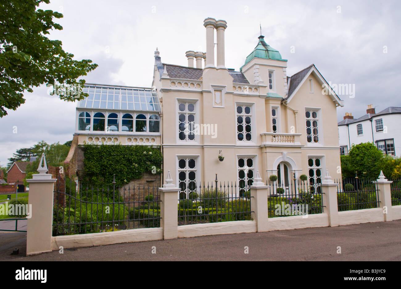 Late Georgian house designed by architect Robert Smirke standing on an original part of the Castle Moat Hereford Herefordshire Stock Photo