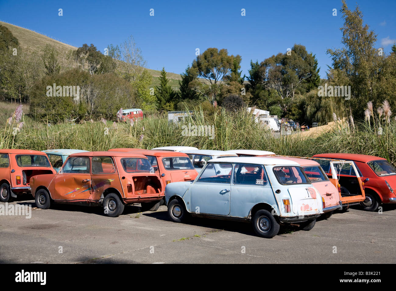 mini cars parked in a scrapyard Stock Photo