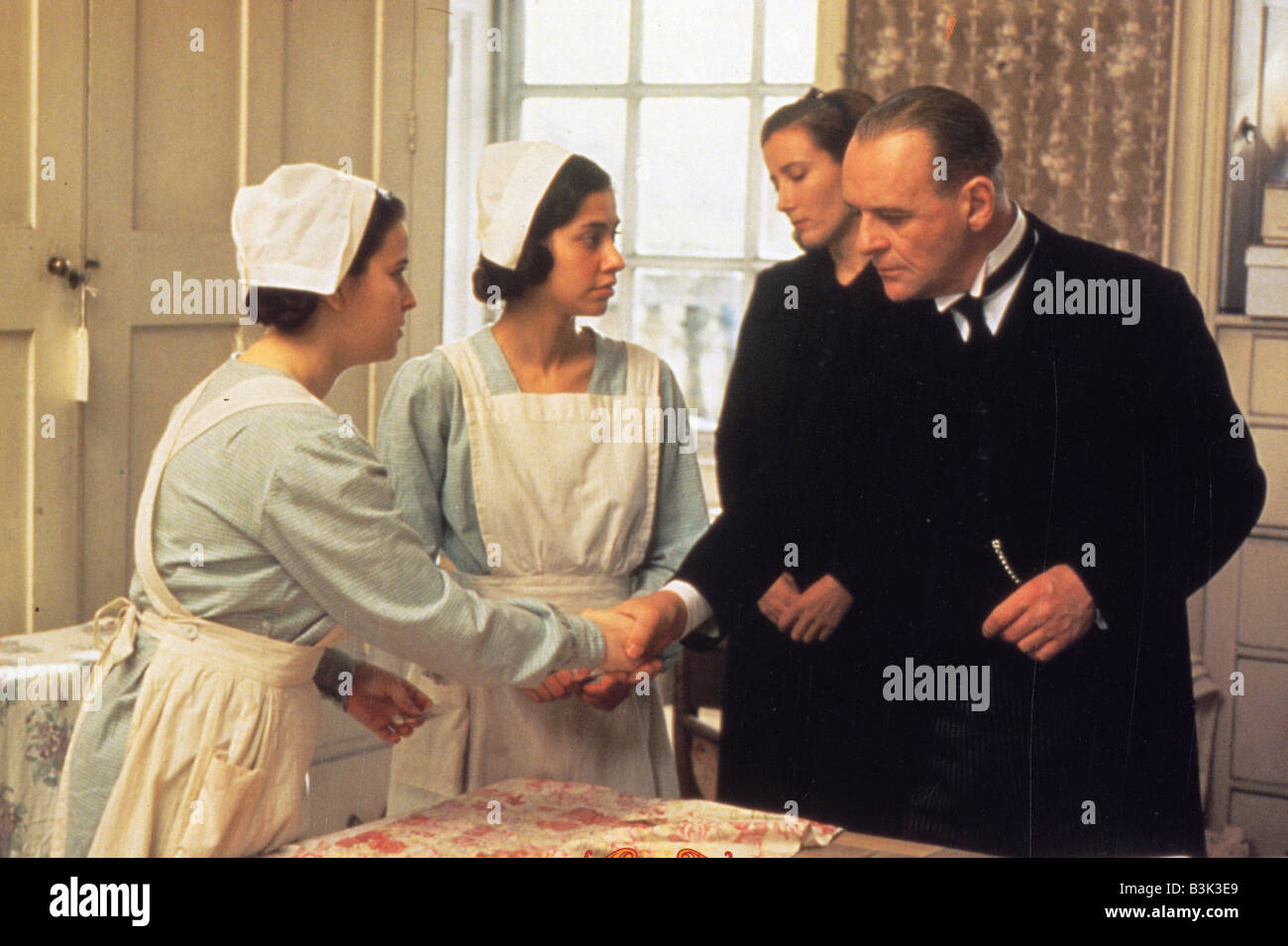 THE REMAINS OF THE DAY 1993 Columbia film with Anthony Hopkins and Emma Thompson at back Stock Photo