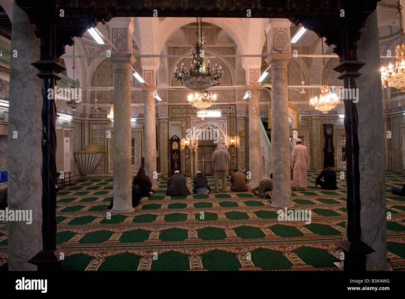 Prayers inside the beautiful interior of the Gurgi Mosque Tripoli Libya Stock Photo