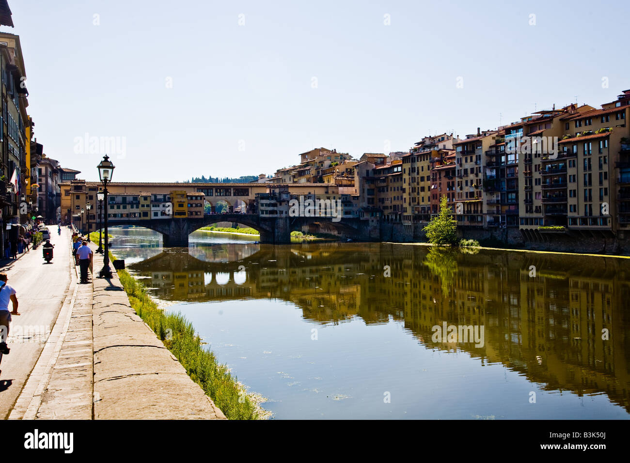 The Ponte Vecchio the ancient bridge that is a shopping street across the Arno Fiume Stock Photo