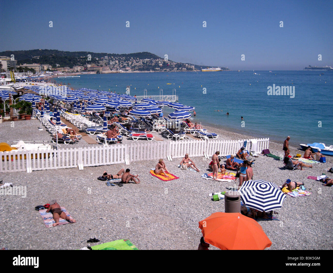 nice-france-sunbathing-along-the-promenade-des-anglais-showing-the