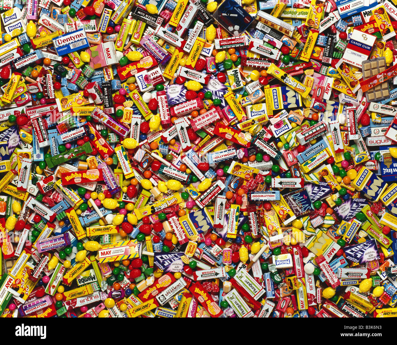 BACKGROUND WITH CHEWING GUM PACKS AND CANDIES Stock Photo - Alamy