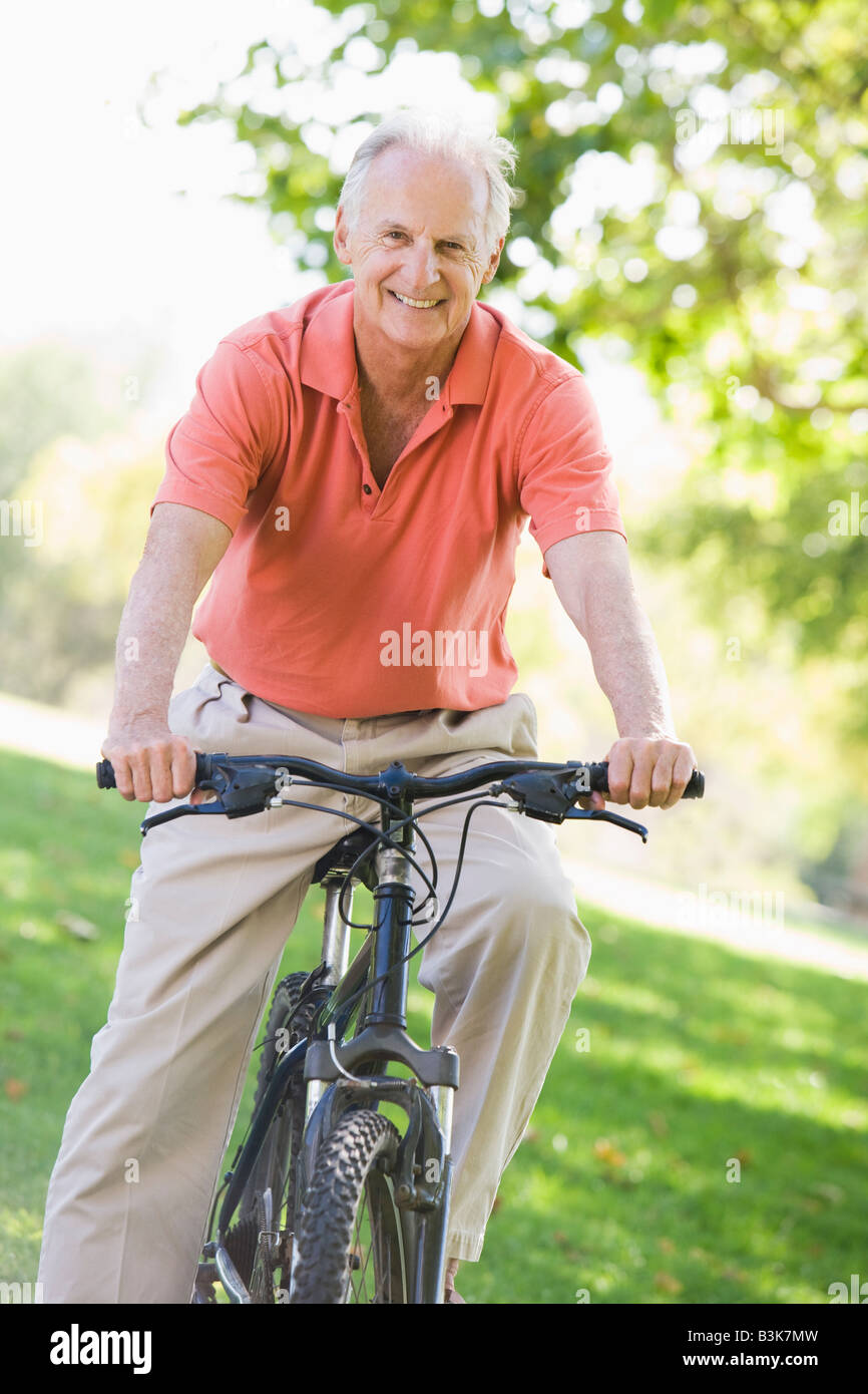 Senior man on a bicycle Stock Photo