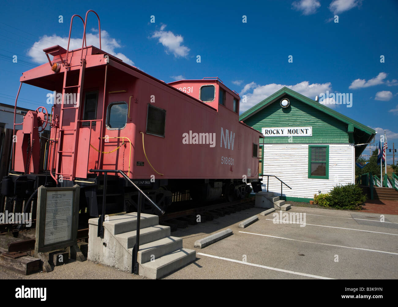 A red caboose sits outside the historic Rocky Mount