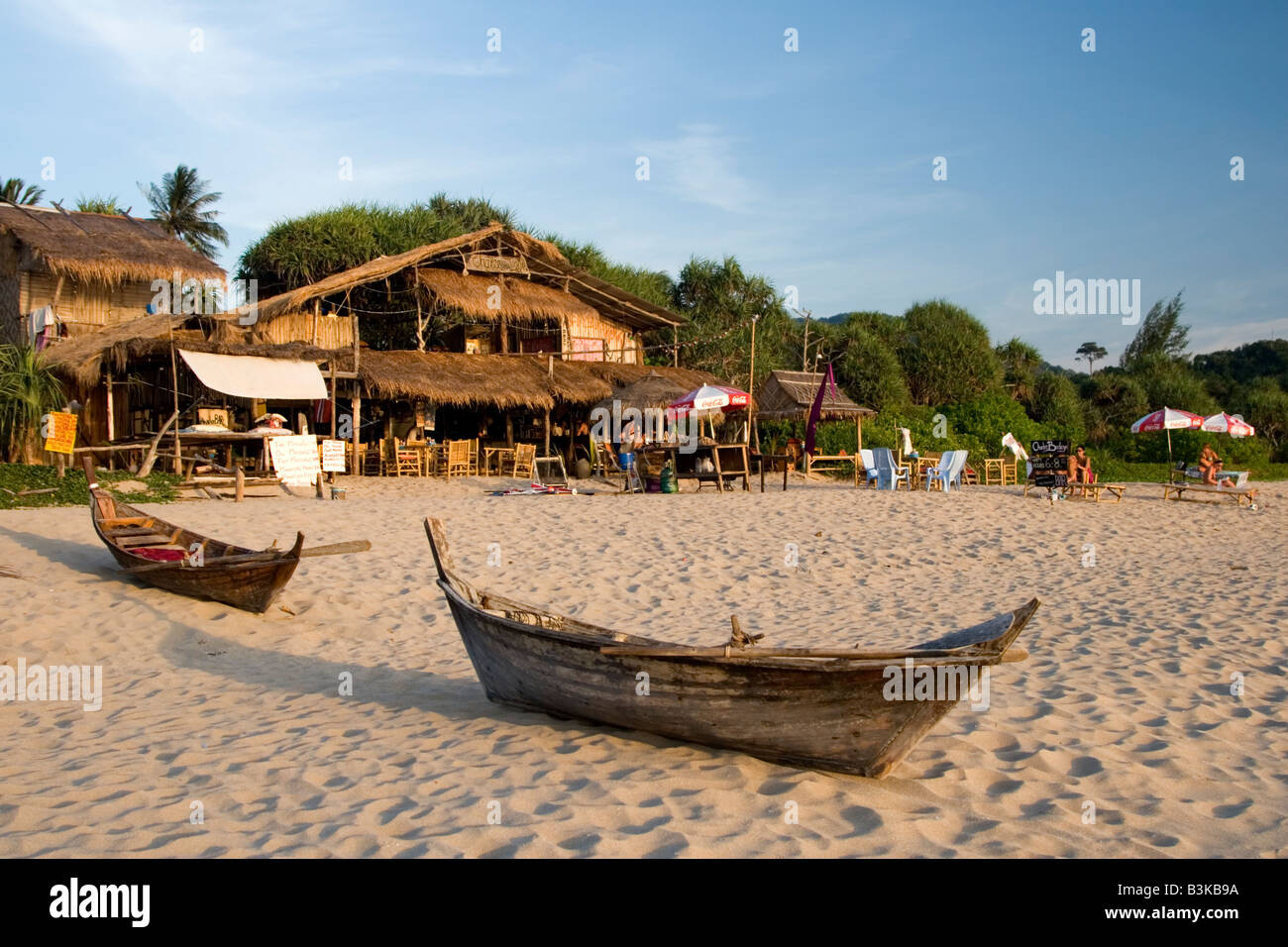Boats and a rustic restaurant on Klong Nin Beach in Ko Lanta an island in Krabi province Thailand Stock Photo