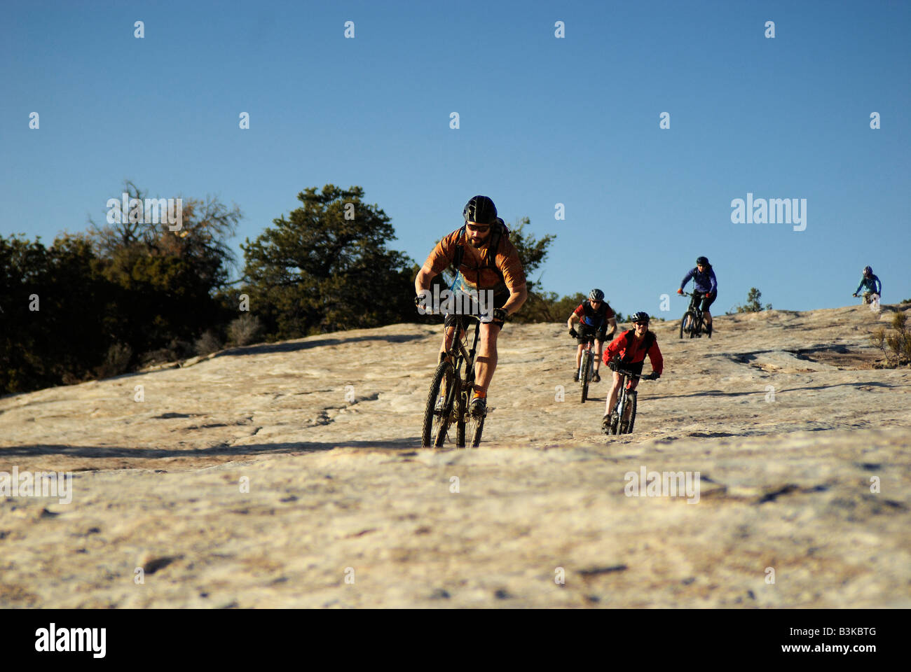 Slickrock Mountain Biking group Utah Stock Photo Alamy