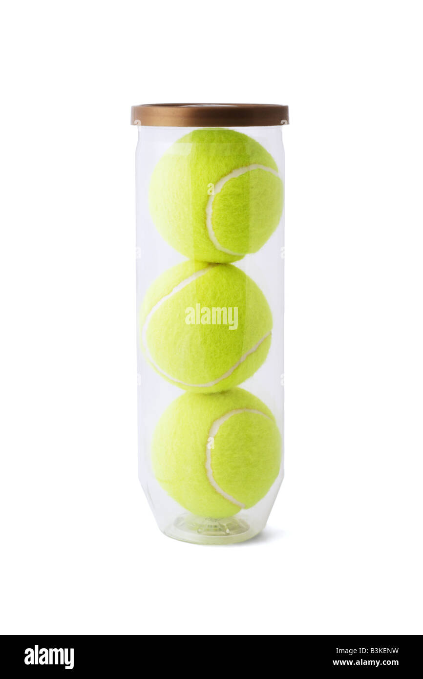 New tennis balls in plastic container on white background Stock Photo