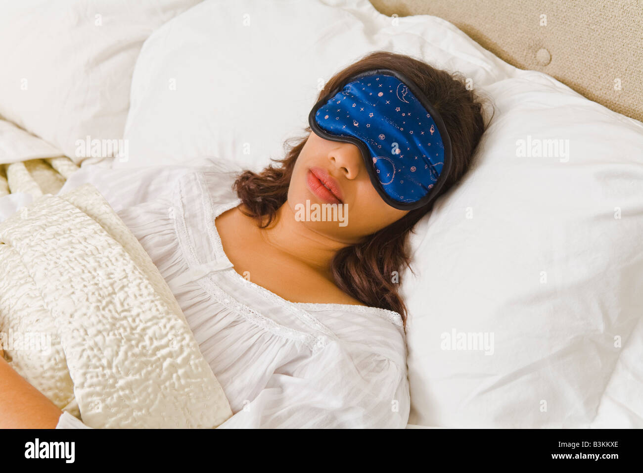 Woman sleeping with eye mask Stock Photo Alamy