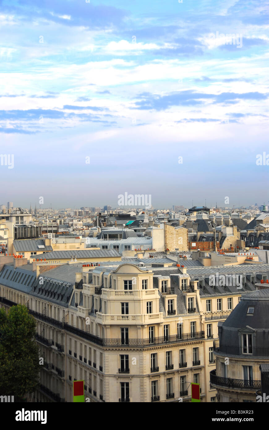 View on Paris rooftops with blue sky Stock Photo - Alamy