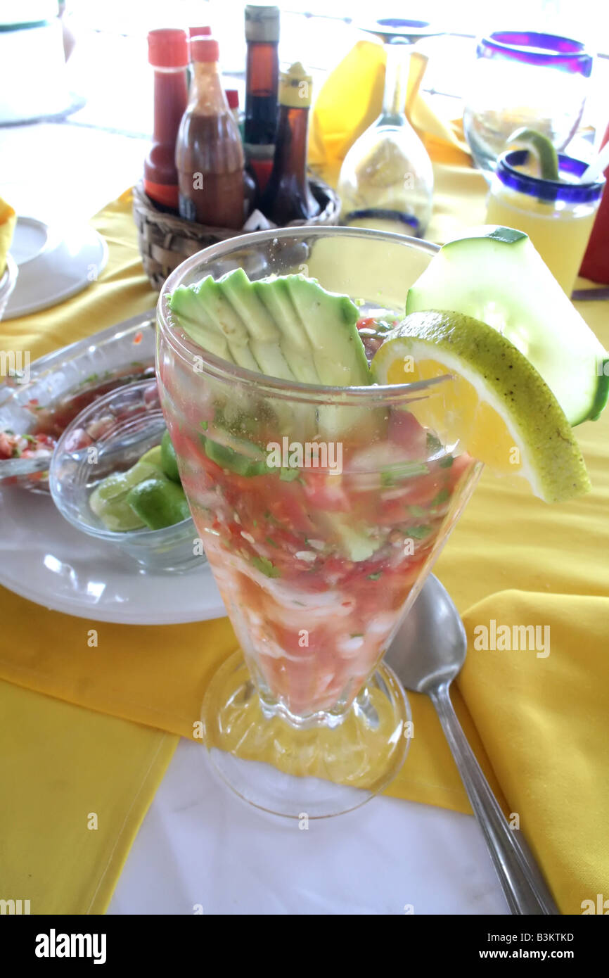Shrimp coctail with garnishments and salsas Stock Photo