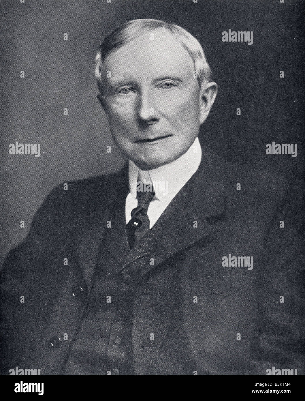 John D. Rockefeller, Sr. and his son John, Jr. leave a wedding in