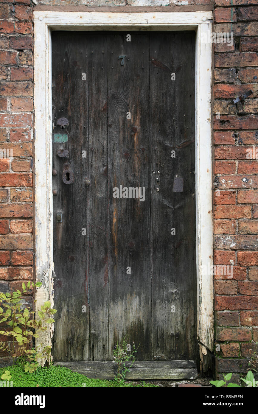 Door of derelict house in Carpenter's Row, Coalbrookdale, near