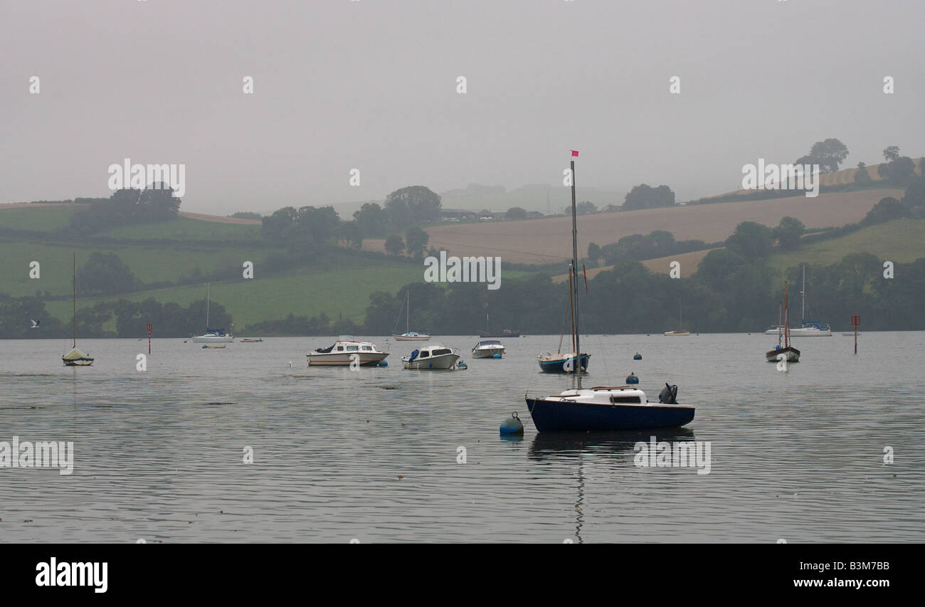 Boats moored on a river Stock Photo