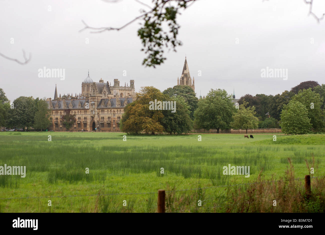 Christ Church College seen across the meadows on a rainy day, Oxford, Oxfordshire, England, UK Stock Photo