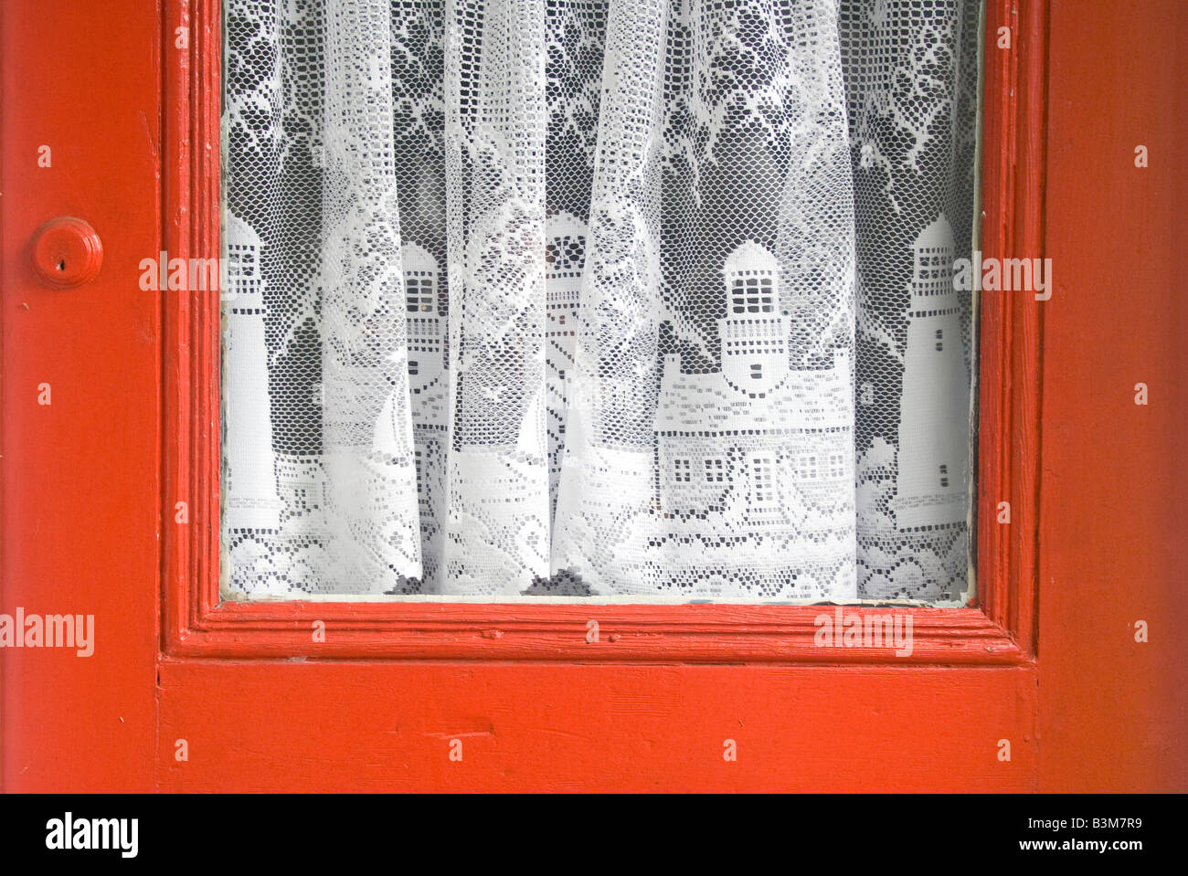 Net curtains decorated with a lighthouse motif in Oak Bluffs Martha s Vineyard Stock Photo