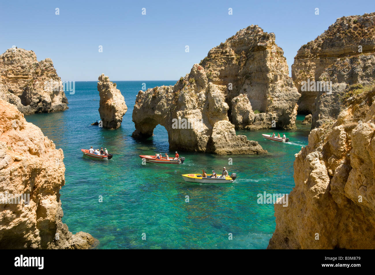 Portugal the Algarve near Lagos Ponta da Piedade tourist boats visiting