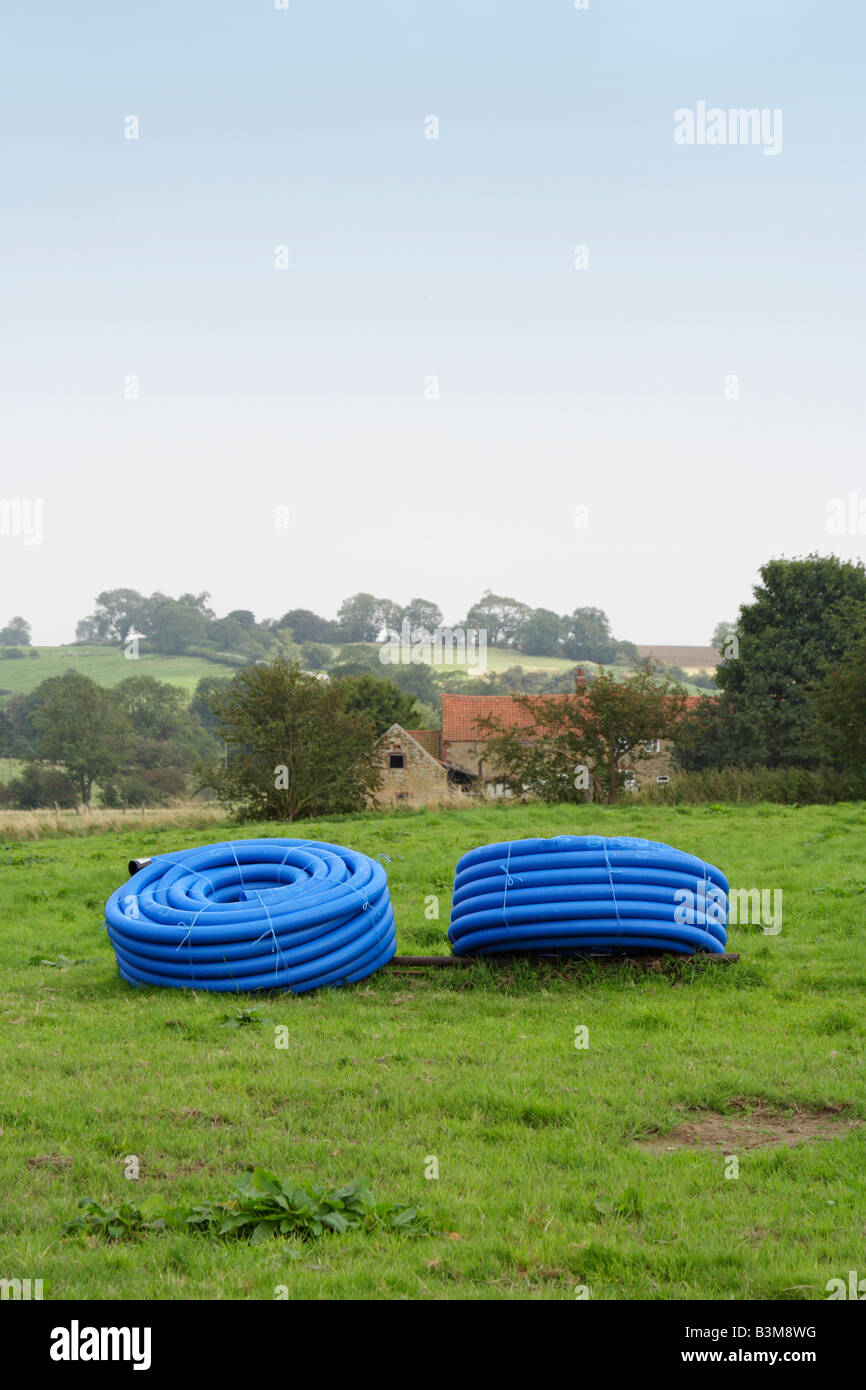 coils of blue water pipe, UK Stock Photo Alamy