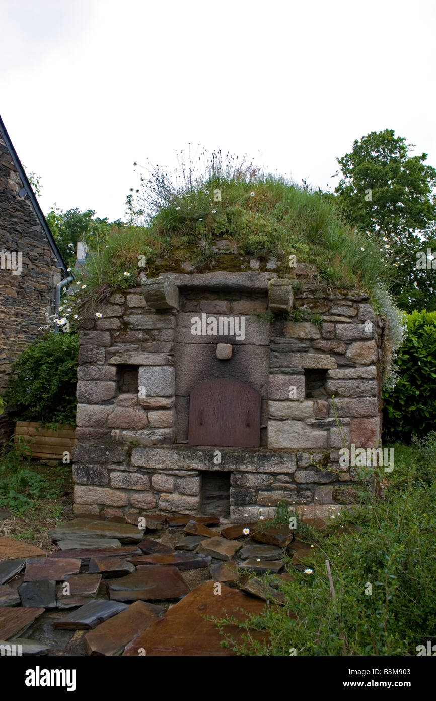 Ancient bread oven in private garden near Pontivy, Brittany, France Stock Photo