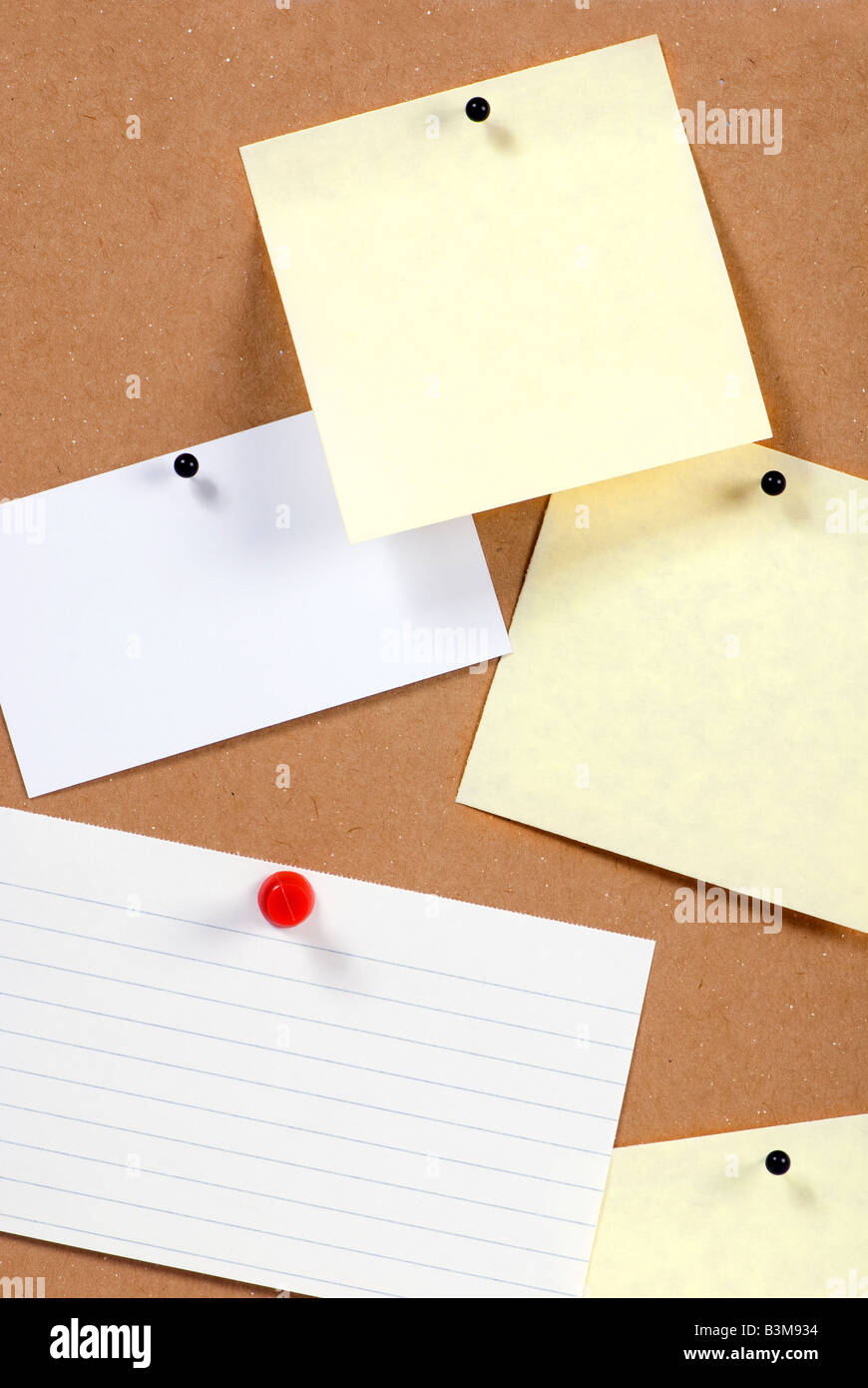 Stuck Up Notes notes stuck to a bulletin board ready to fill in Stock Photo - Alamy