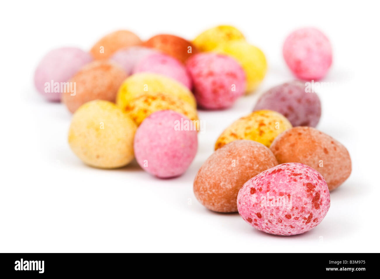 Colorful mini easter eggs isolated on white Stock Photo