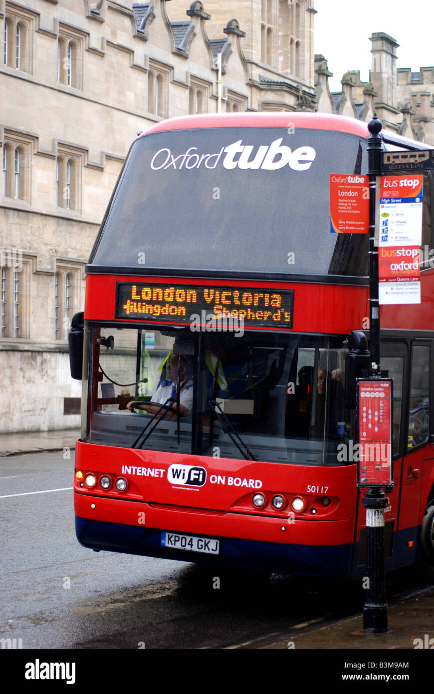 Oxford Tube bus in High Street on a wet day, Oxford, Oxfordshire, England, UK Stock Photo