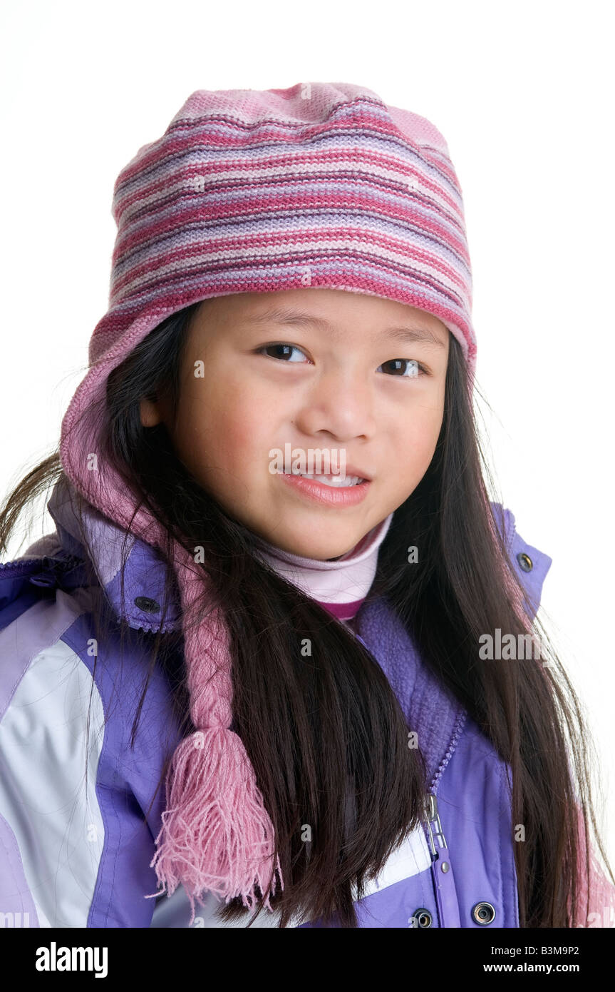 A young girl dressed up for some fun in the snow Stock Photo Alamy