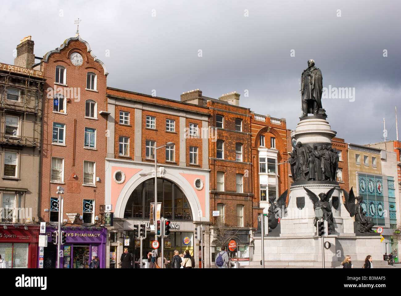 O'Connell statue and shops on O'Connell Street in Dublin Stock Photo Alamy