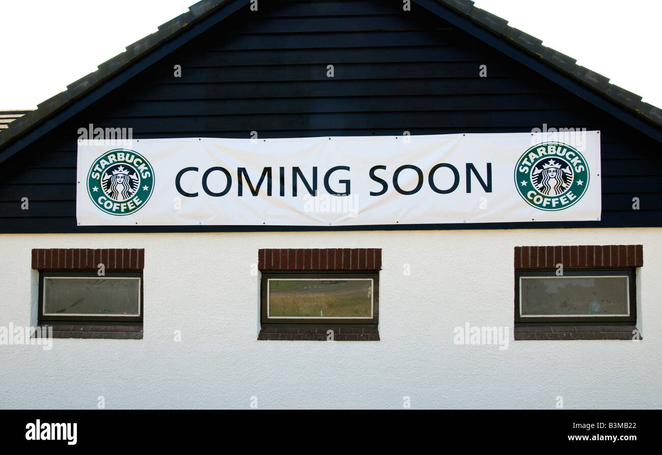'starbucks' cooming soon sign on a roadside building in cornwall,uk Stock Photo