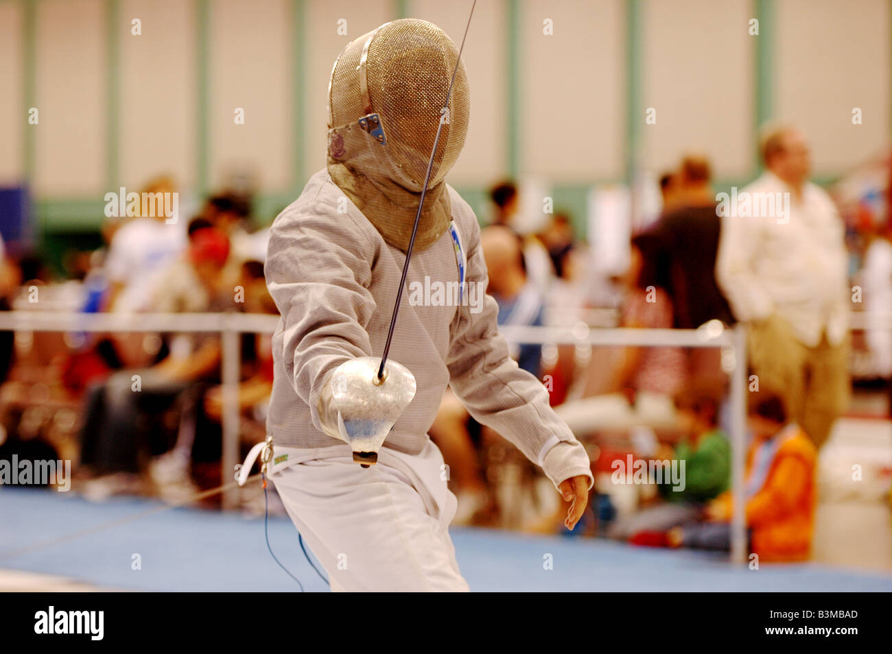 teenager competing in fencing tournament Stock Photo Alamy