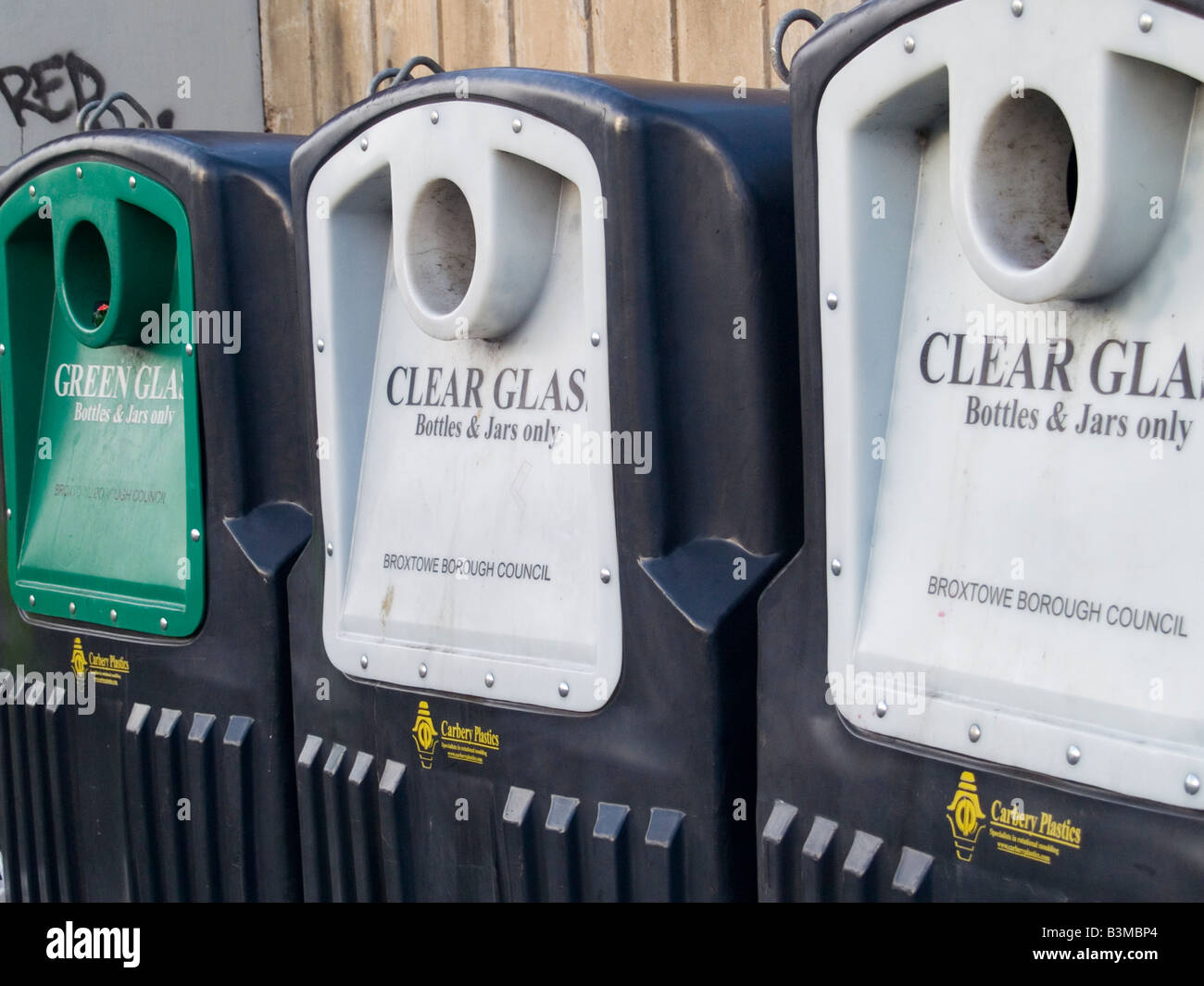 Glass recycling bins at a bring site in the Borough of Broxtowe,  Nottinghamshire England UK Stock Photo - Alamy