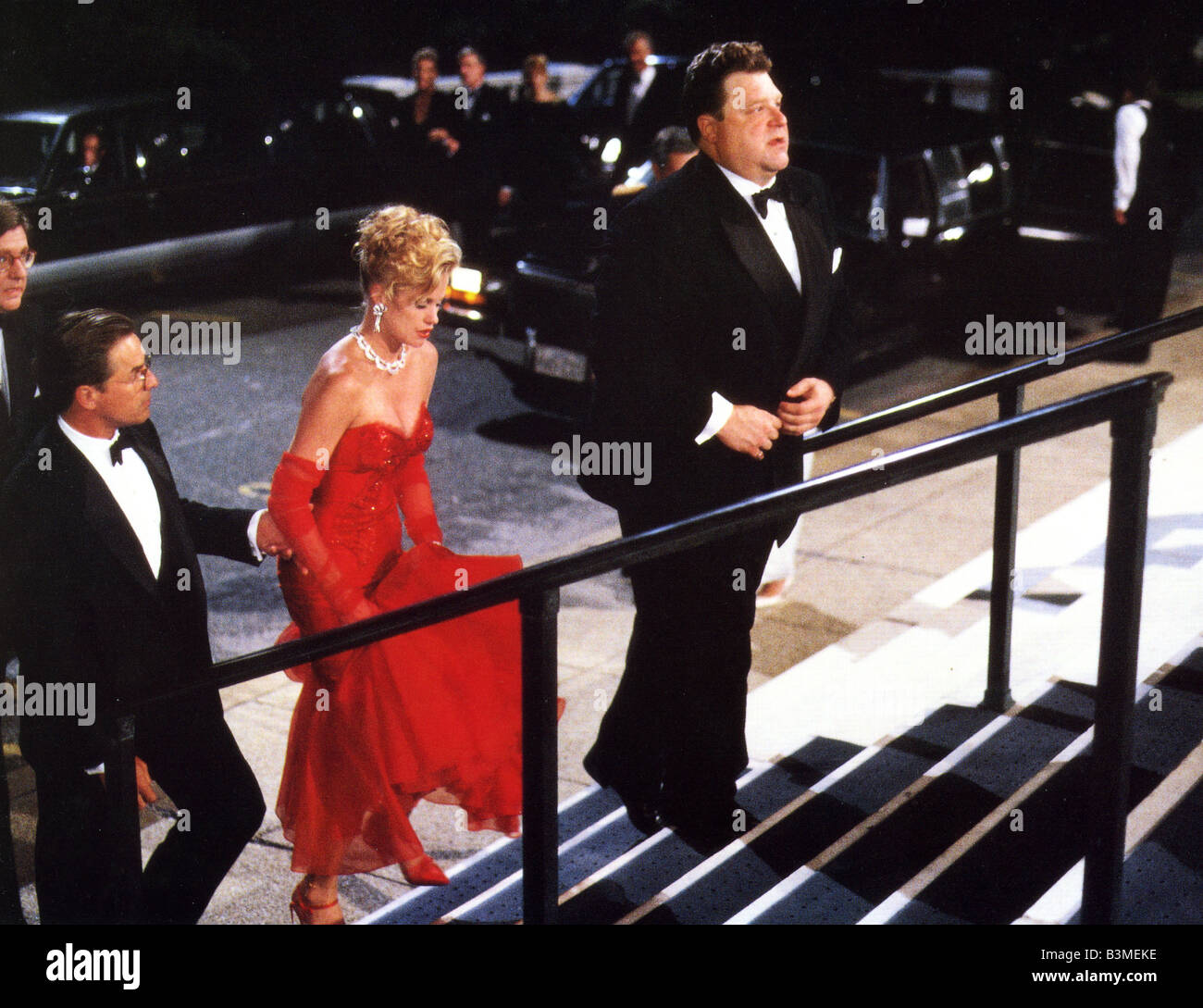 BORN YESTERDAY 1993 Warner film with Melanie Griffith and Don Johnson at left and John Goodman Stock Photo