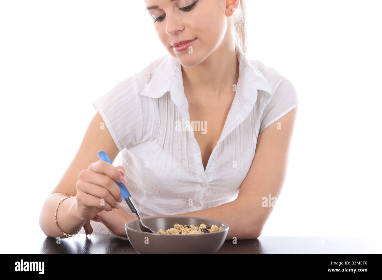 Young Woman Eating Granola Cereal Model Released Stock Photo Alamy