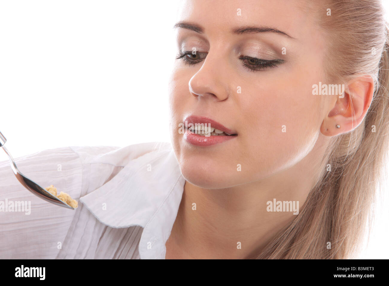 Young Woman Eating Granola Cereal Model Released Stock Photo Alamy