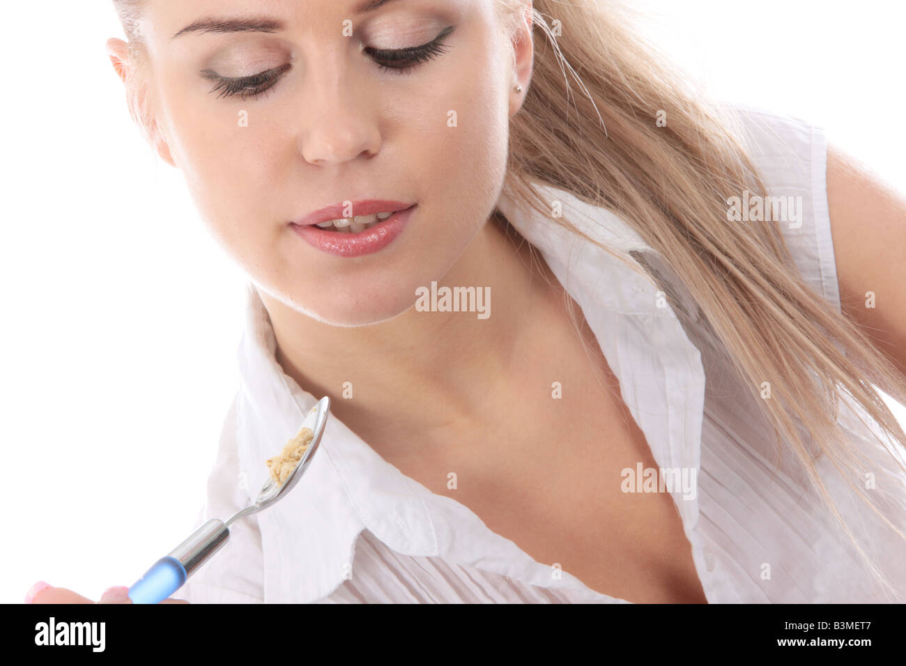 Young Woman Eating Granola Cereal Model Released Stock Photo Alamy