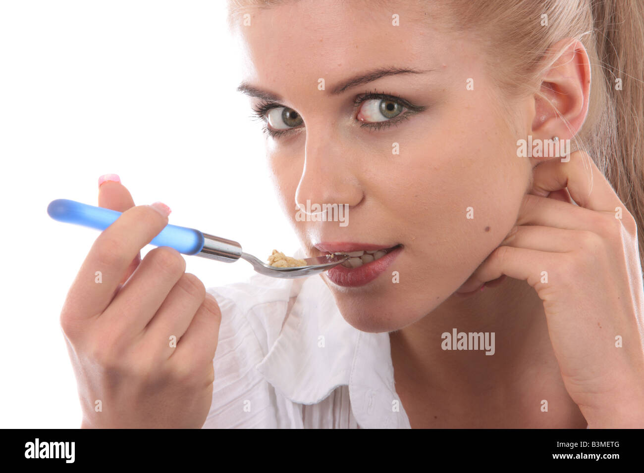 Young Woman Eating Granola Cereal Model Released Stock Photo Alamy