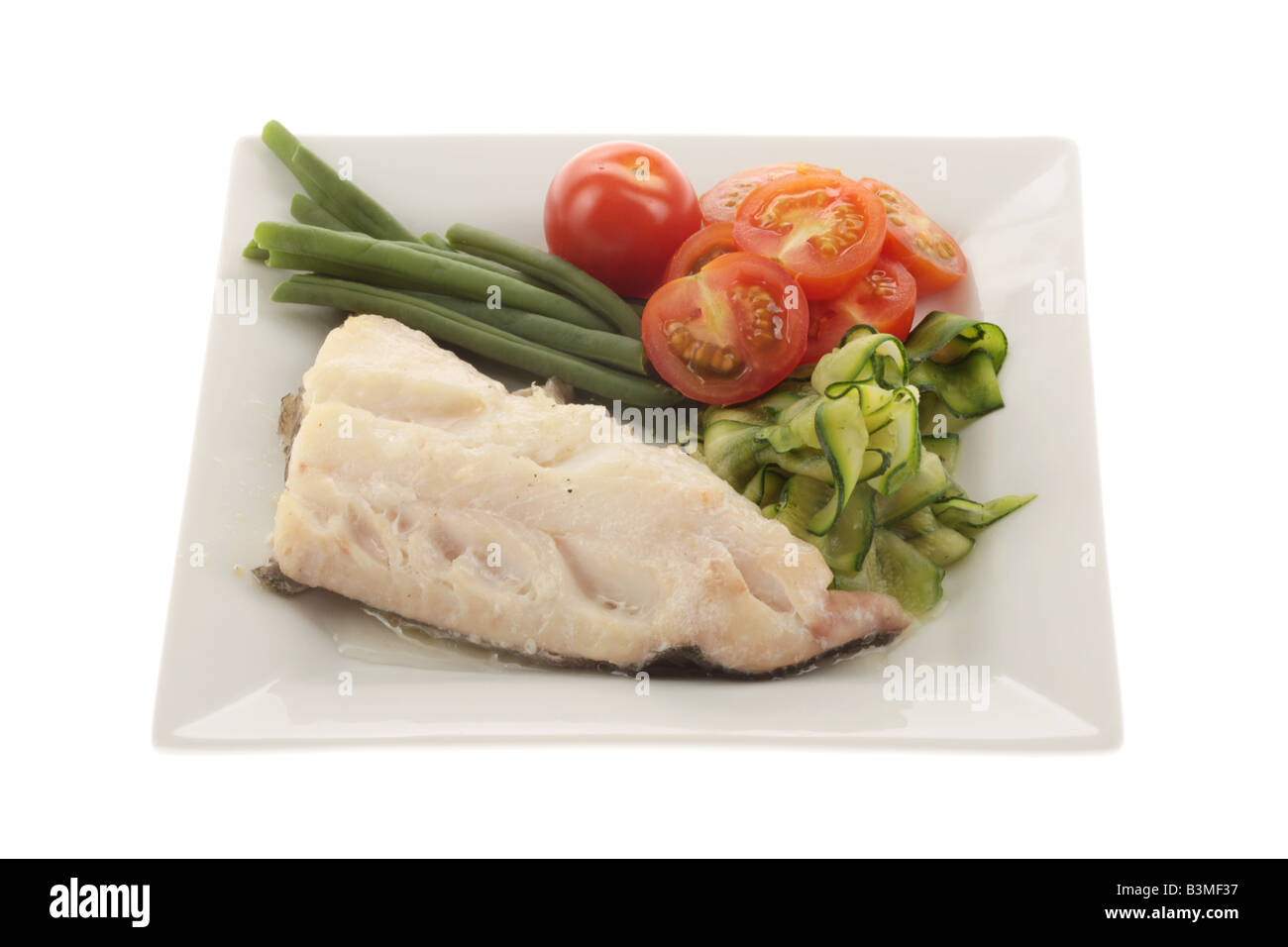 Baked Haddock with Vegetables Stock Photo Alamy