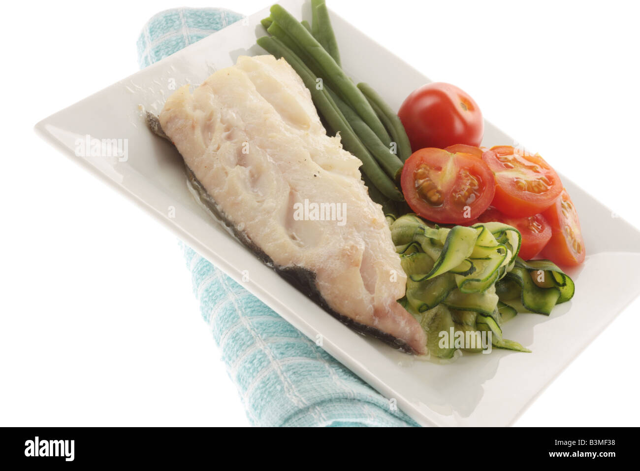 Baked Haddock with Vegetables Stock Photo Alamy