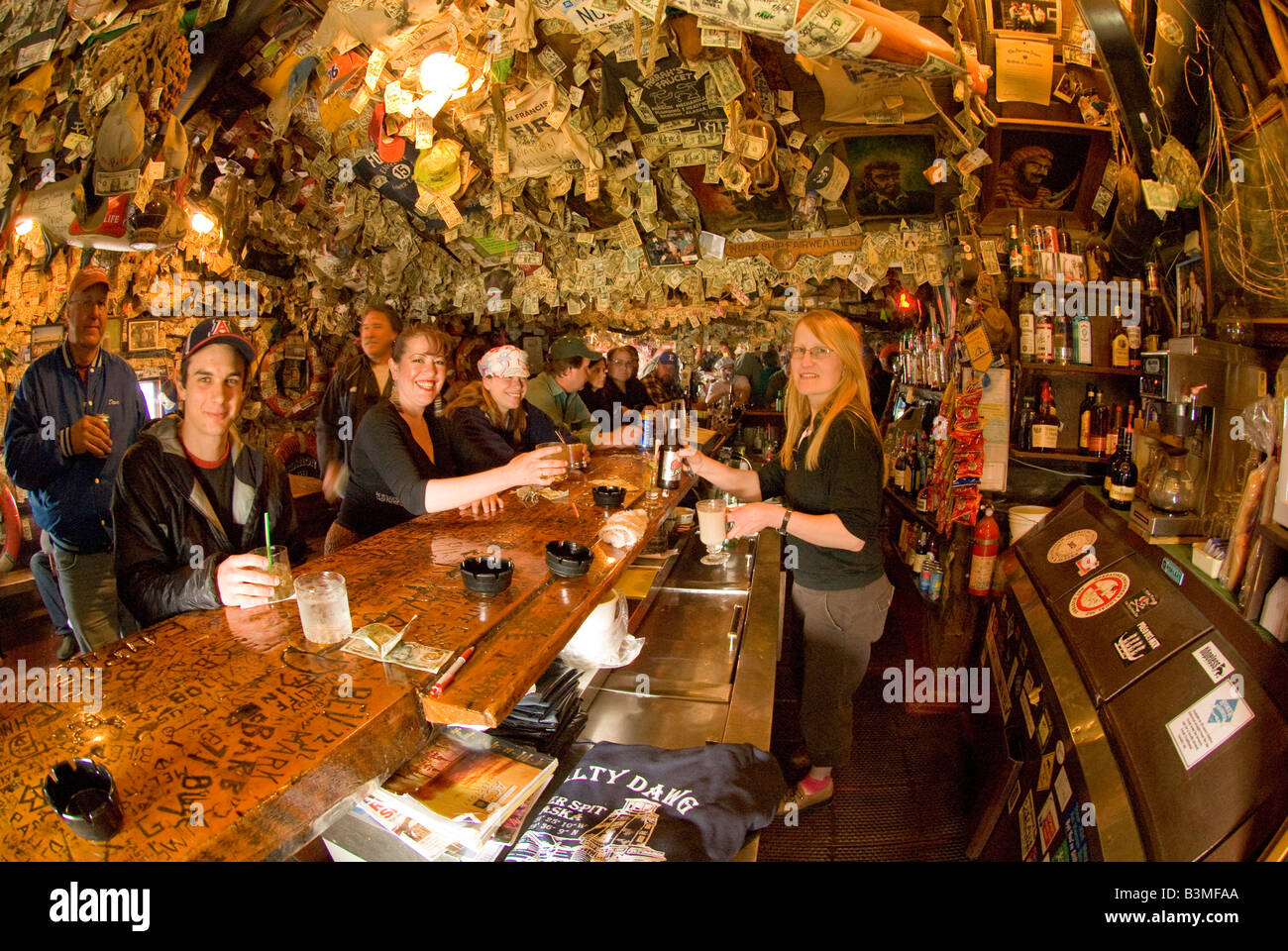 HOMER ALASKA PATRONS ENJOYING DRINKS AT THE FAMOUS SALTY DOG TAVERN