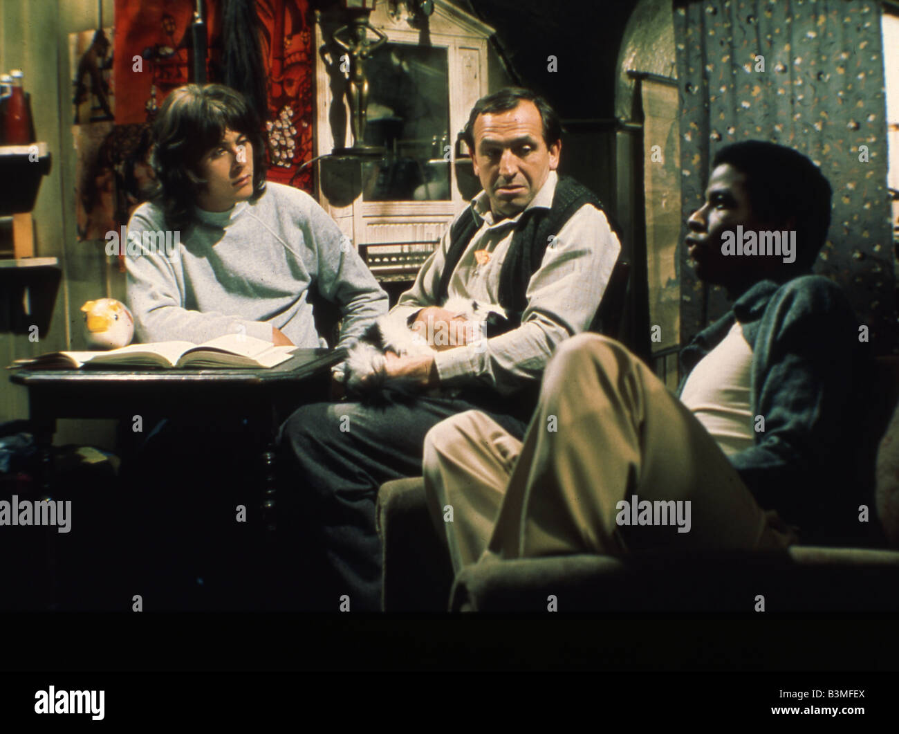 RISING DAMP Yorkshire TV comedy series with from left Richard Beckinsale, Leonard Rossiter and Don Warrington Stock Photo