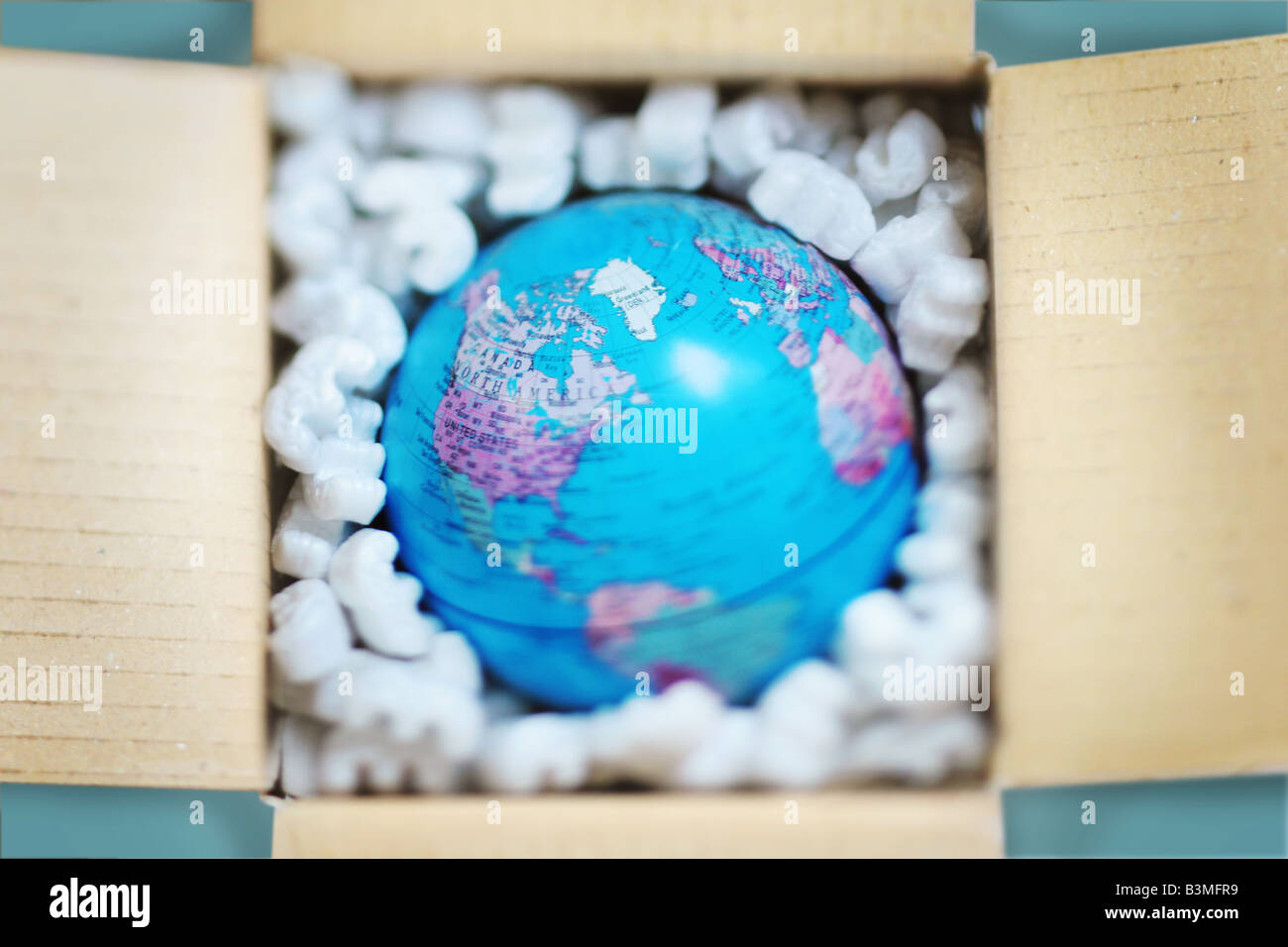 globe in protective packaging Stock Photo